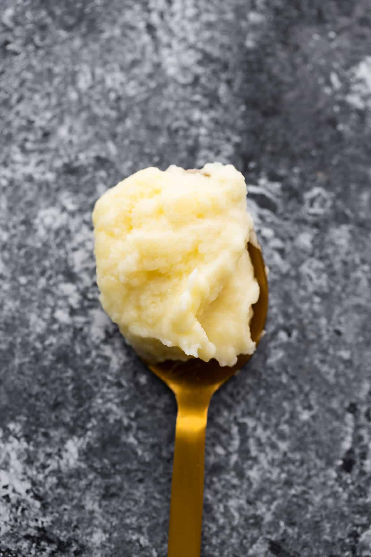 mashed potatoes on spoon