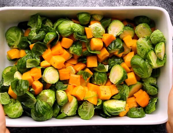 brussels sprouts and butternut squash in roasting pan
