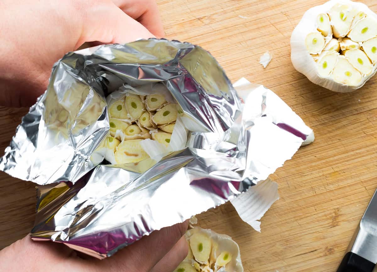 wrapping head of garlic in foil