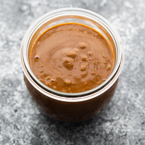 close up of peanut sauce in jar