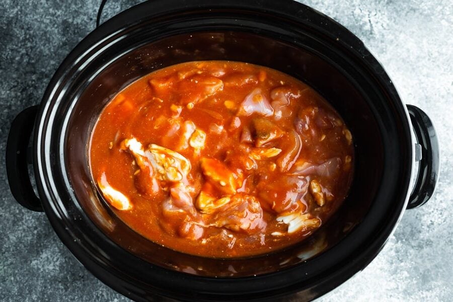 indian butter chicken in crockpot before cooking