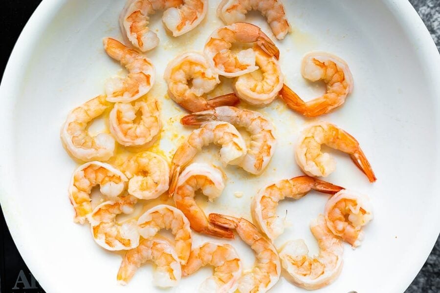 overhead view of shrimp in frying pan
