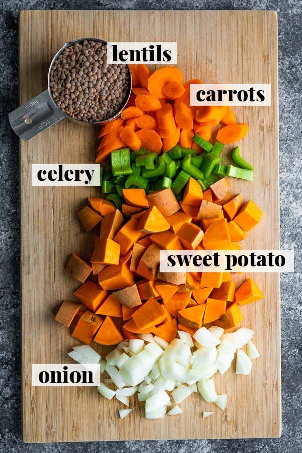 ingredients for instant pot lentils on wood cutting board from overhead