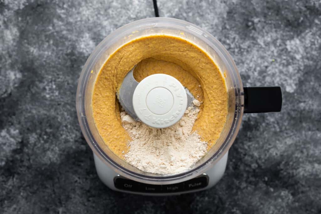 adding oat flower to chickpea cookie dough.