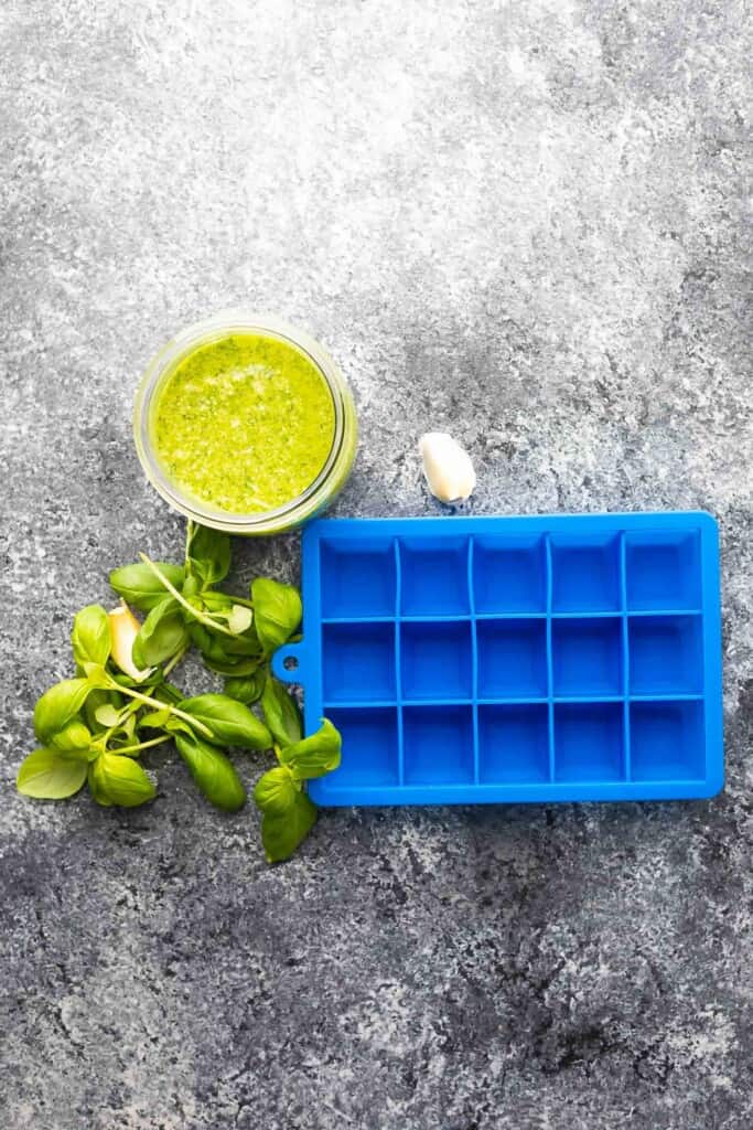 Materials gathered for Freezing Pesto in Ice Cube Trays Vertical