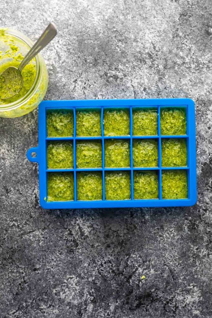 Overhead shot of Classic Basil Pesto in Ice Cube Tray before freezing