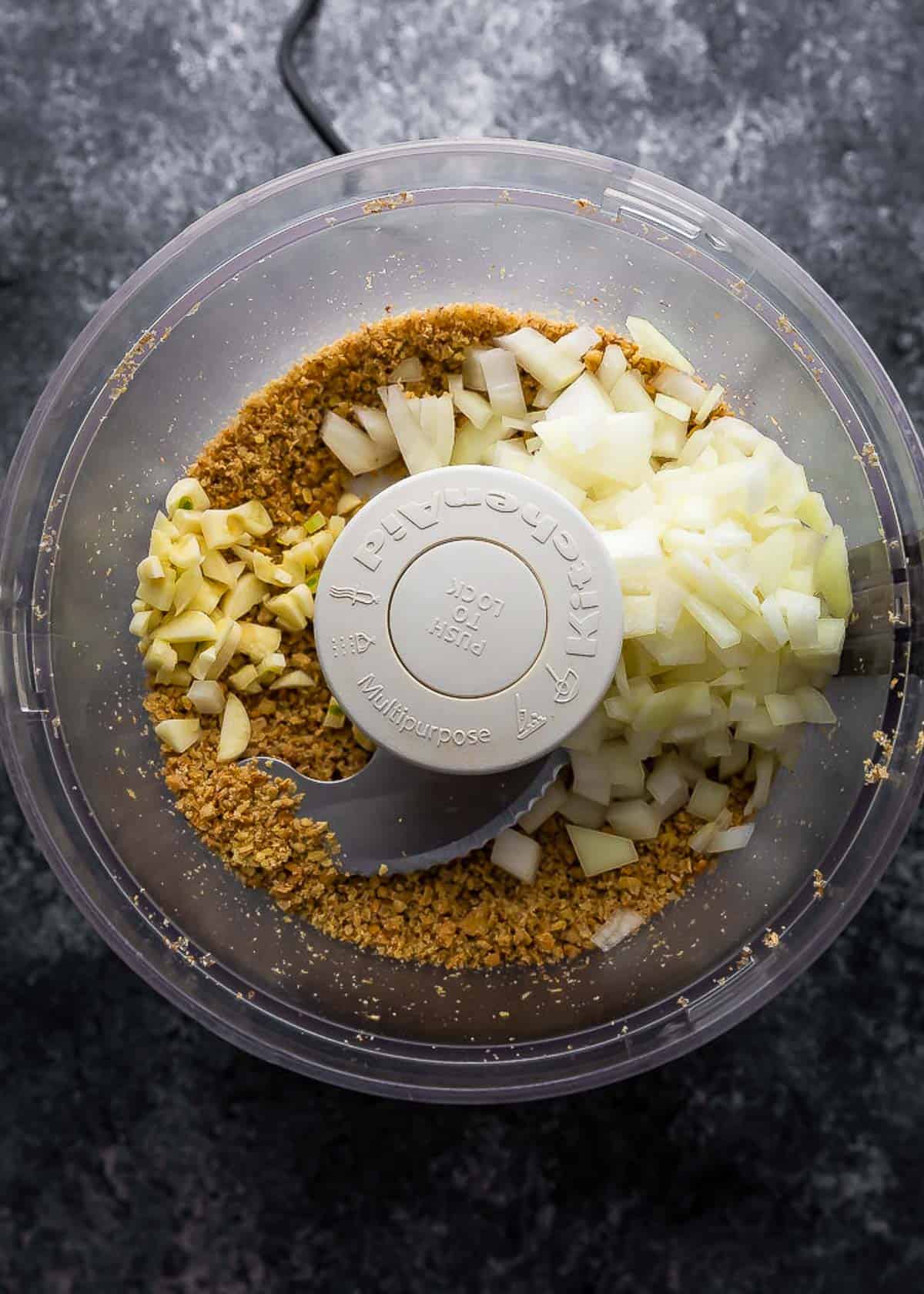 nuts, onion and garlic in a food processor 