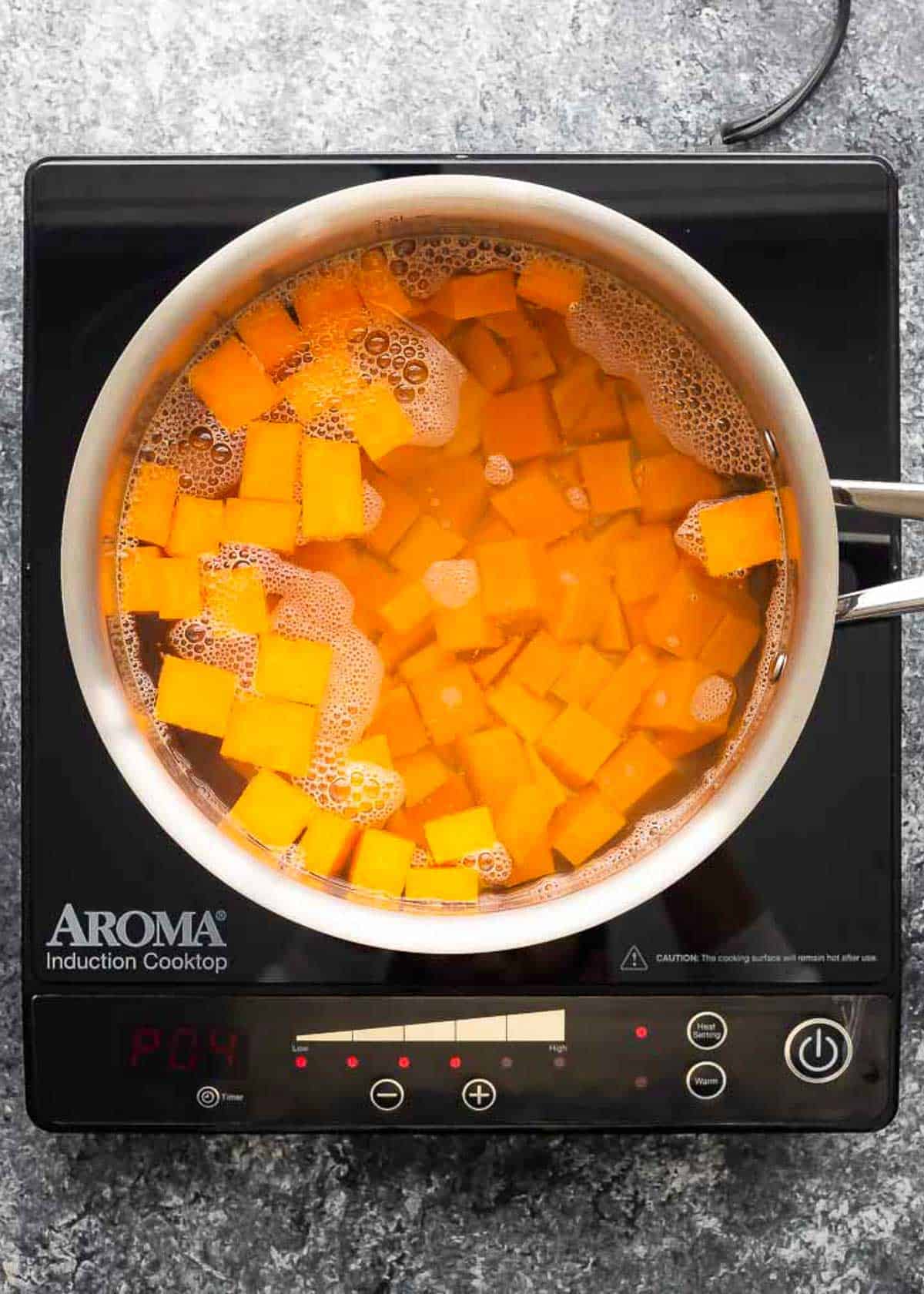 sweet potatoes in a pot of water