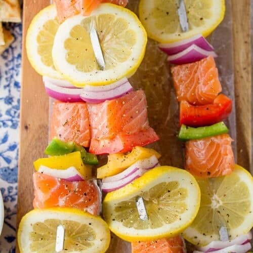 a close up shot of salmon skewers