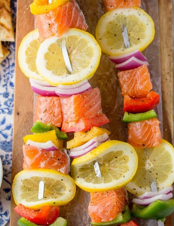 a close up shot of salmon skewers