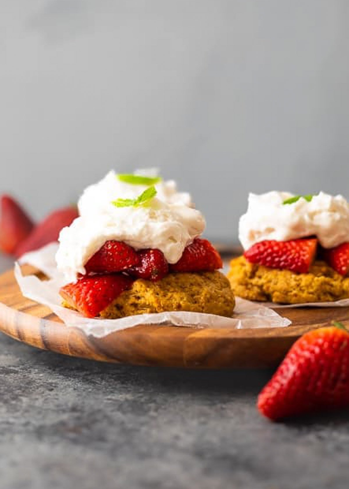 assembled strawberry shortcakes with mint