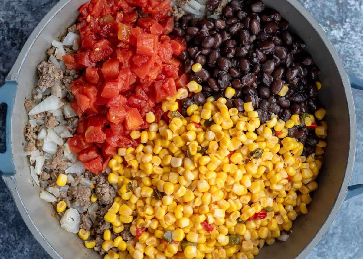 ingredients for taco casserole in skillet