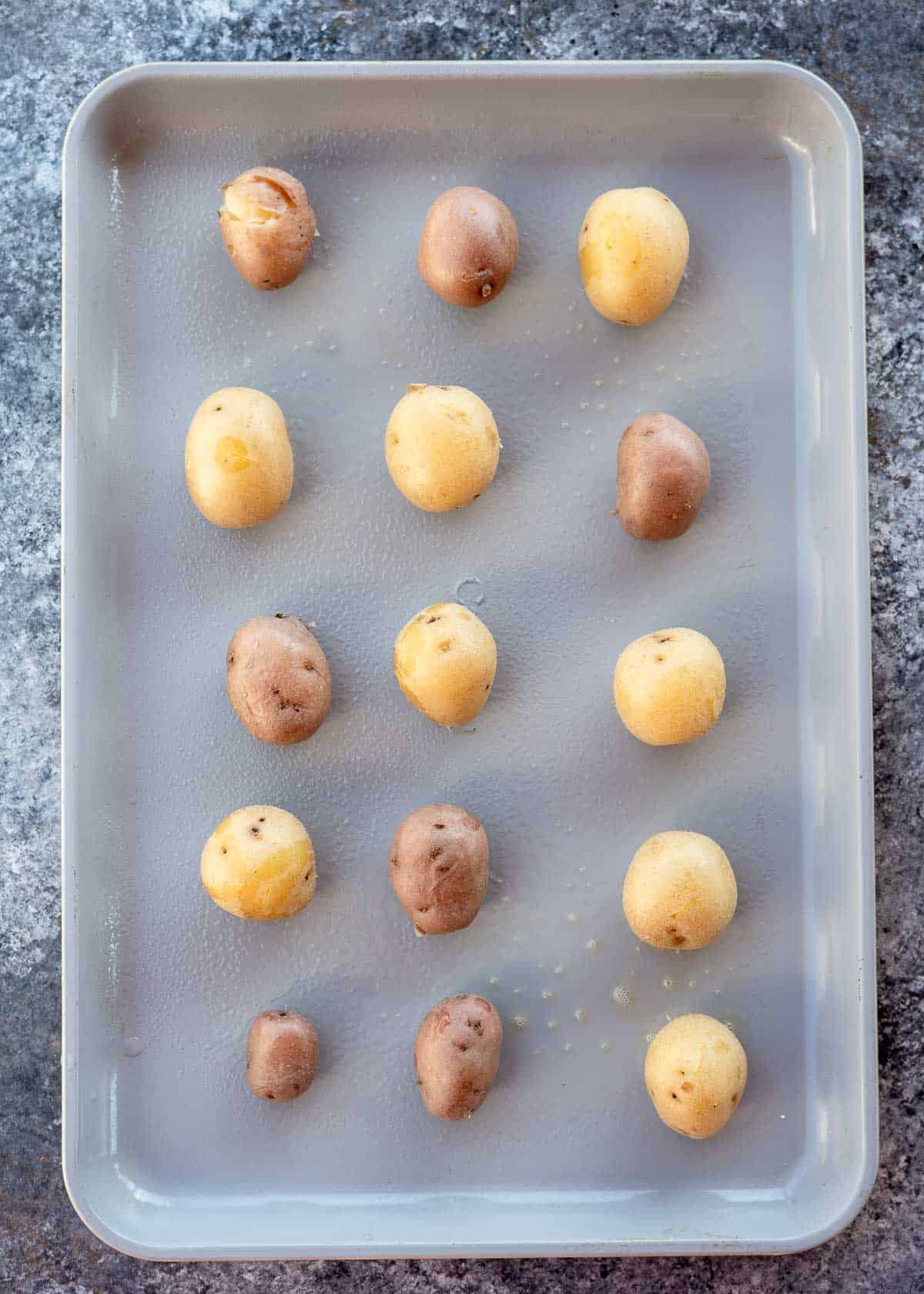 Potatoes on a baking tray