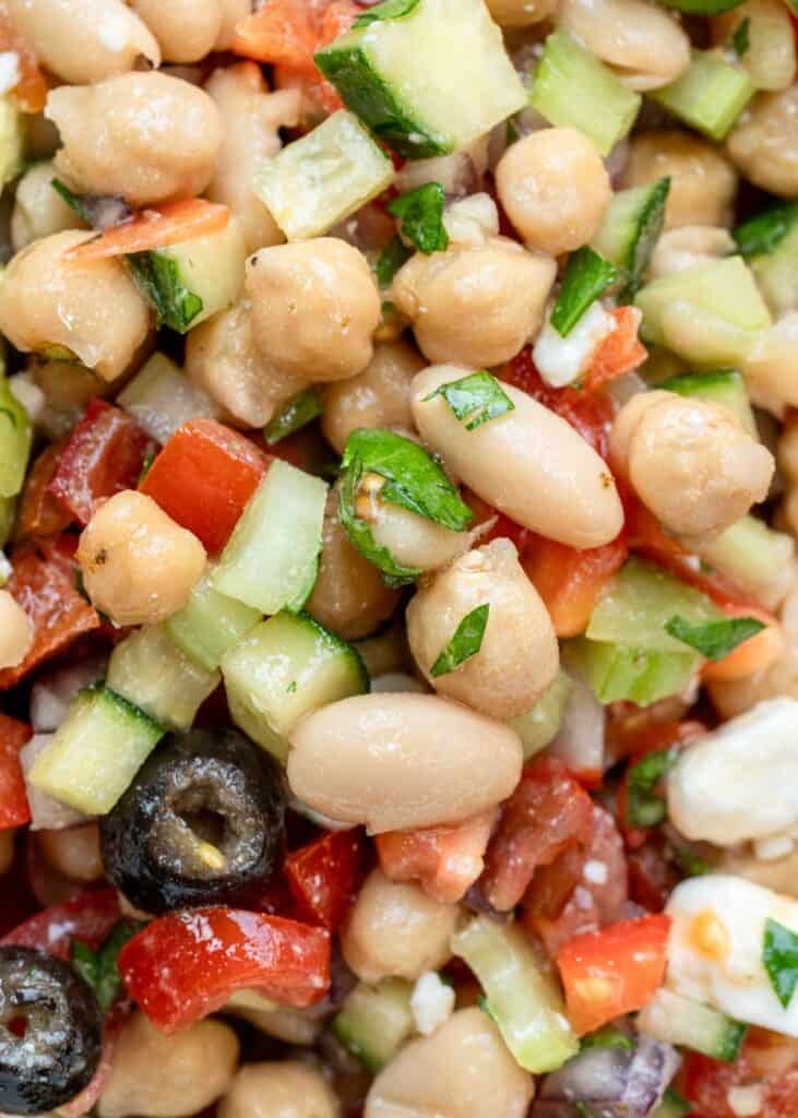 a super closeup shot of bean and veggie salad