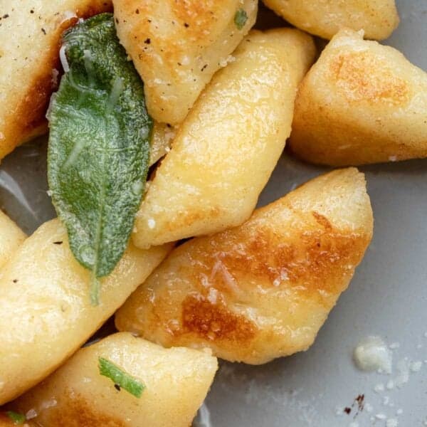 a close up of cottage cheese gnocchi with brown butter