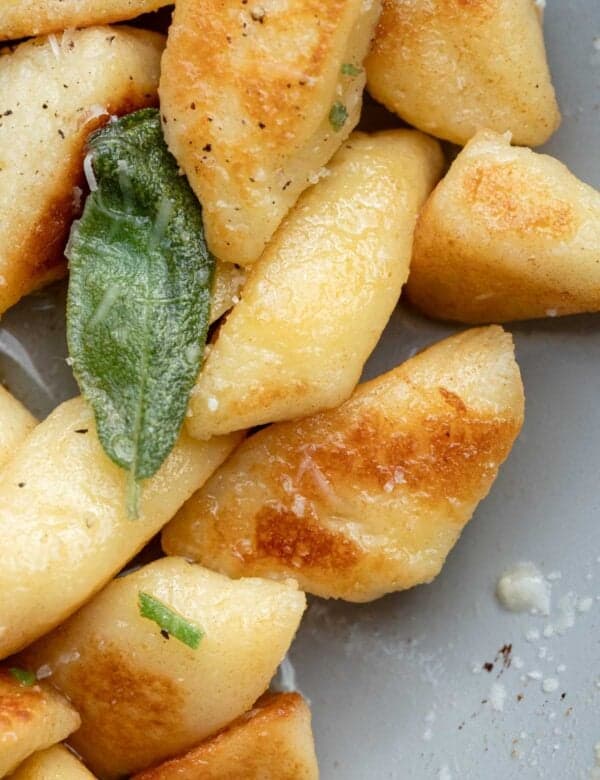 a close up of cottage cheese gnocchi with brown butter