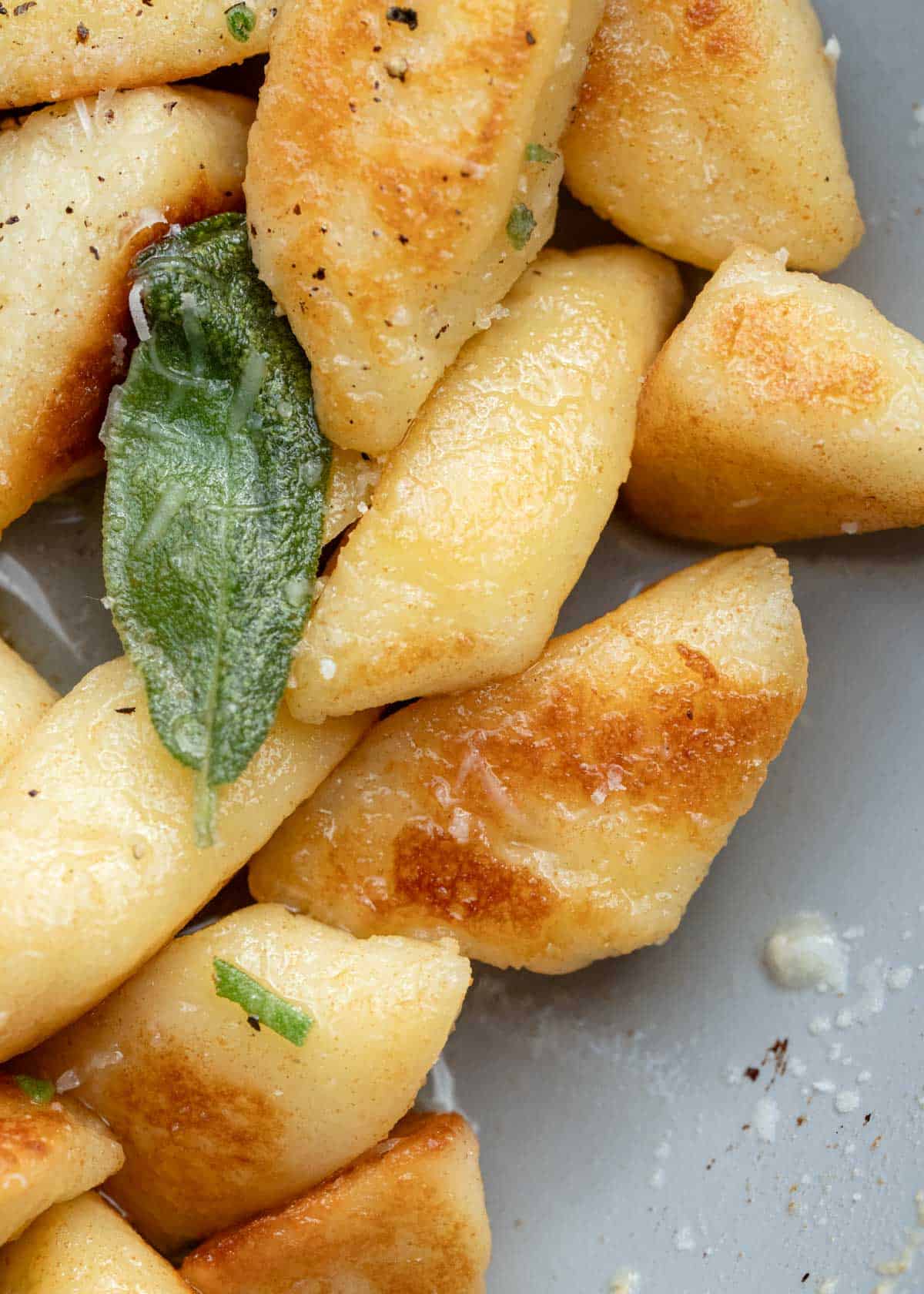 a close up of cottage cheese gnocchi with brown butter