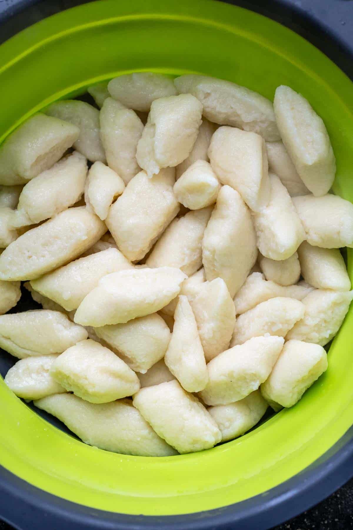 gnocchi in a strainer