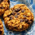 a closeup of pumpkin spice breakfast cookies on a blue plate