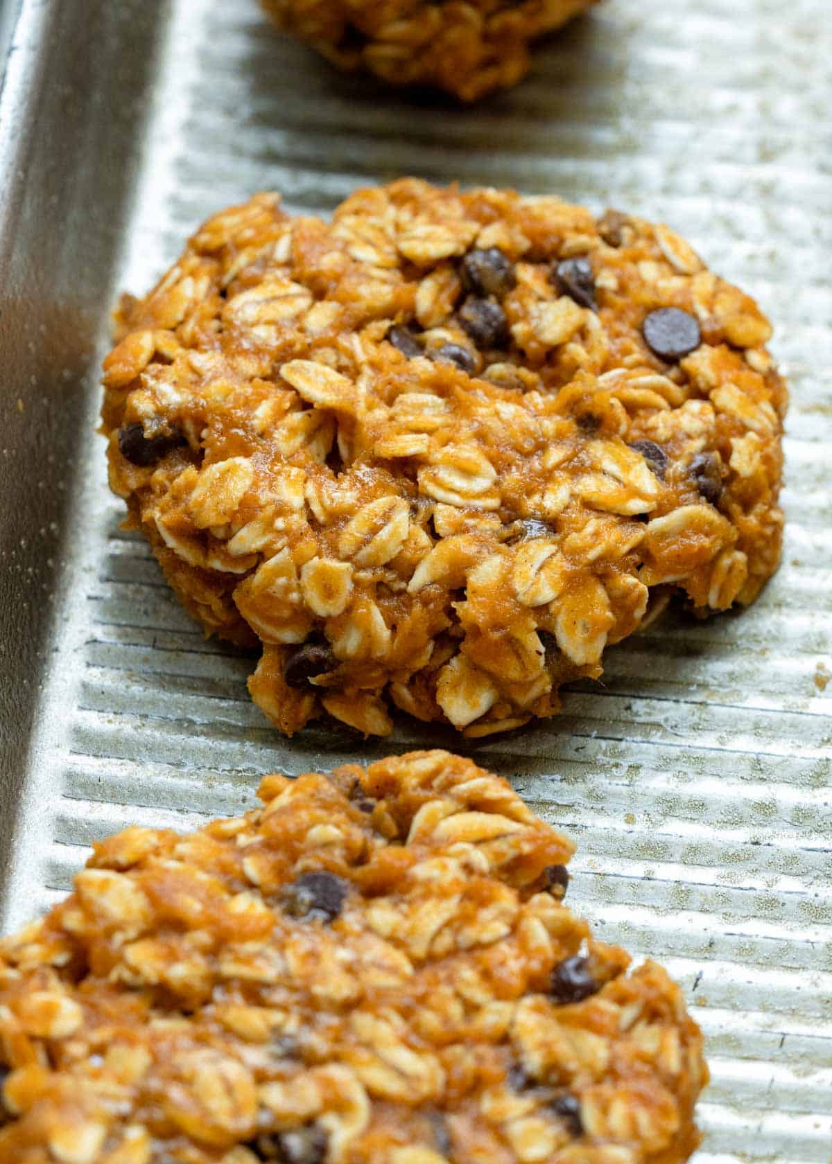 pumpkin breakfast cookies on a baking sheet