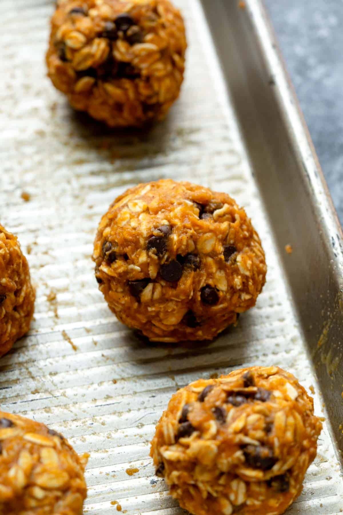 pumpkin breakfast cookies on a baking sheet