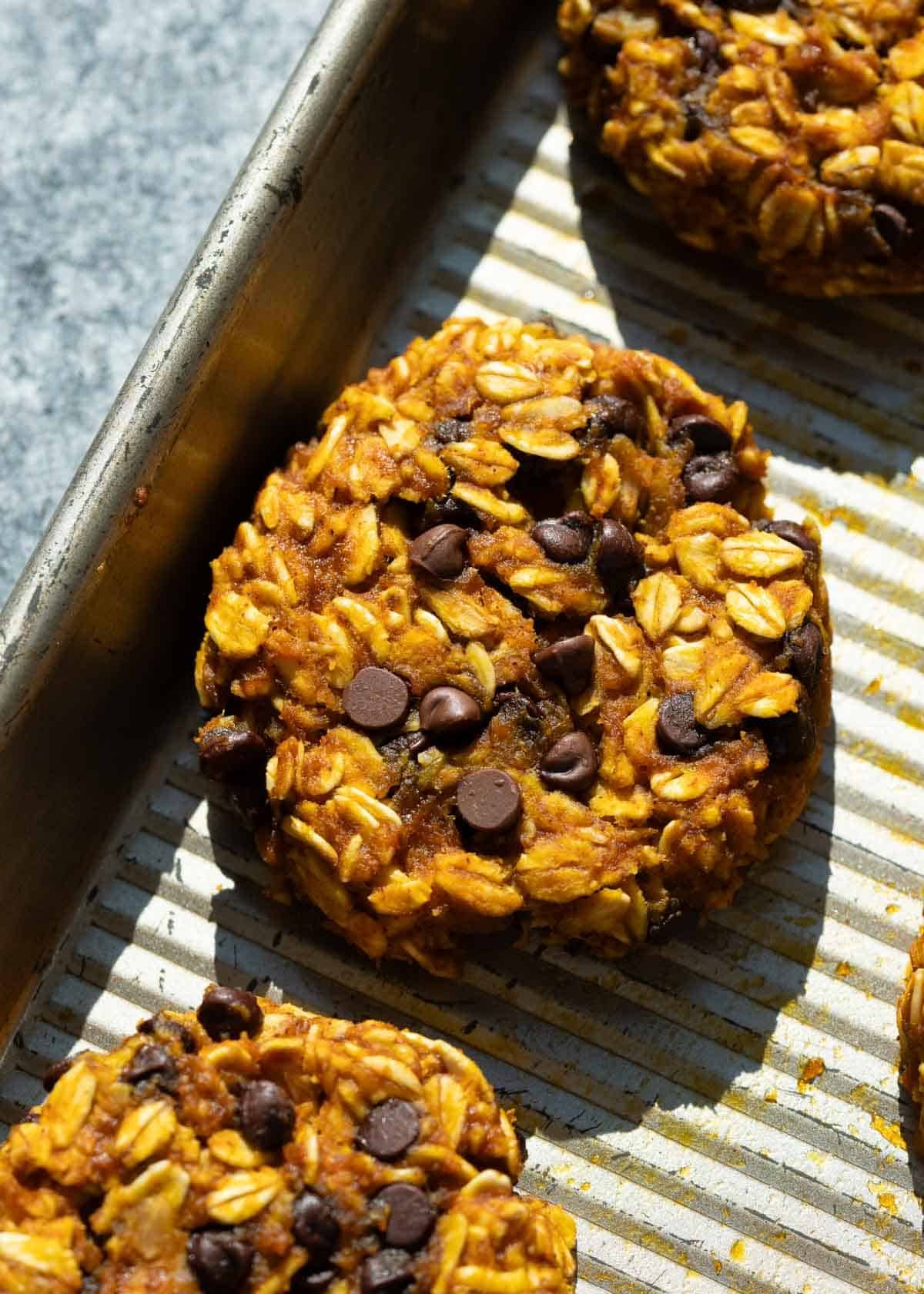pumpkin spice breakfast cookies on a baking sheet
