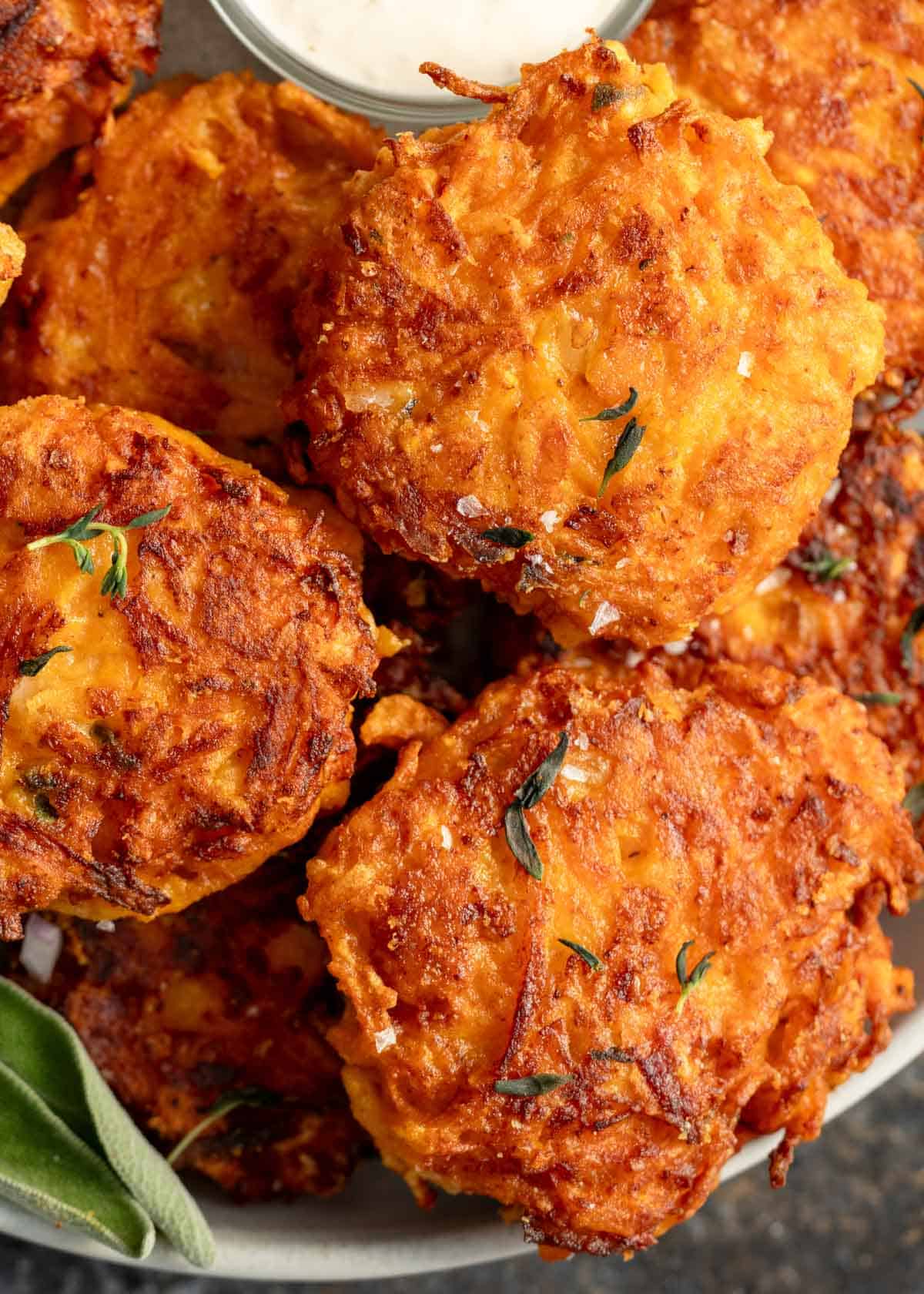 a close up shot of butternut squash fritters