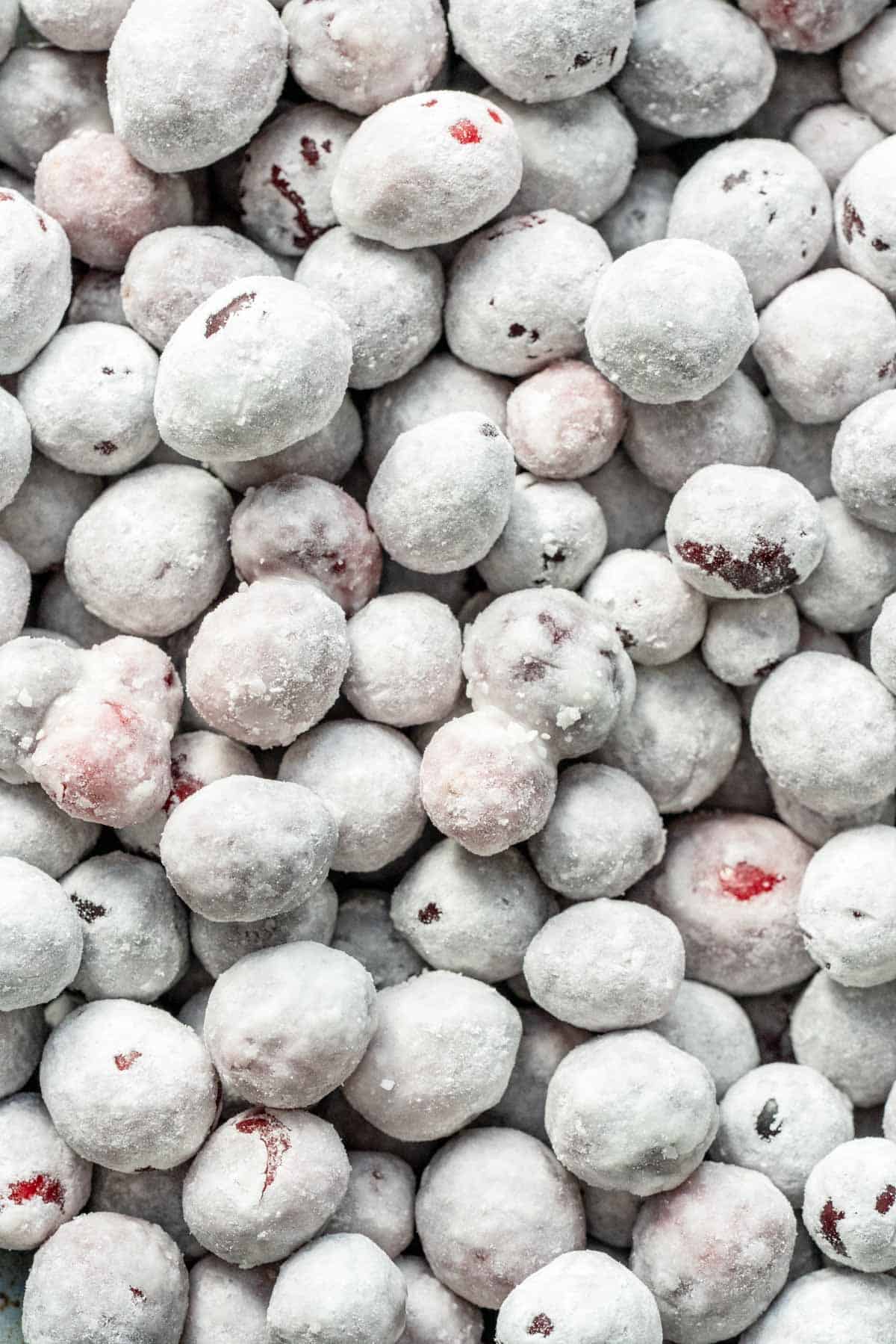 a very closeup shot of candied cranberries