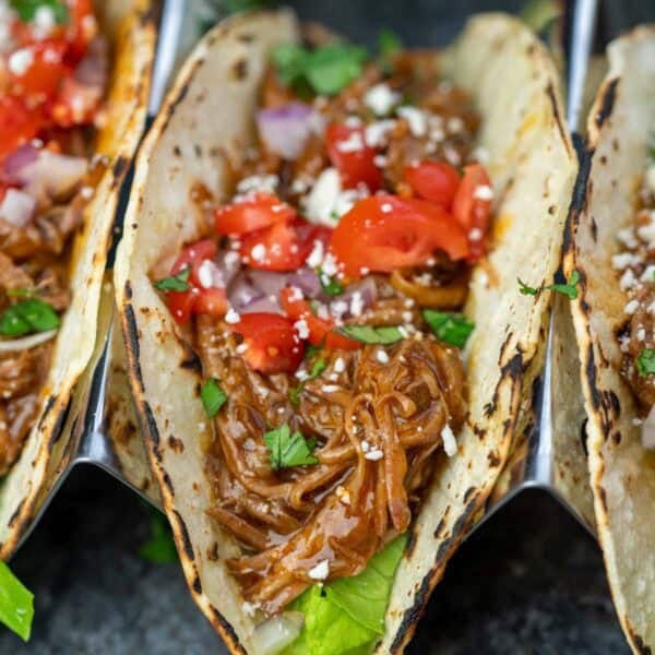 tacos filled with slow cooker shredded beef
