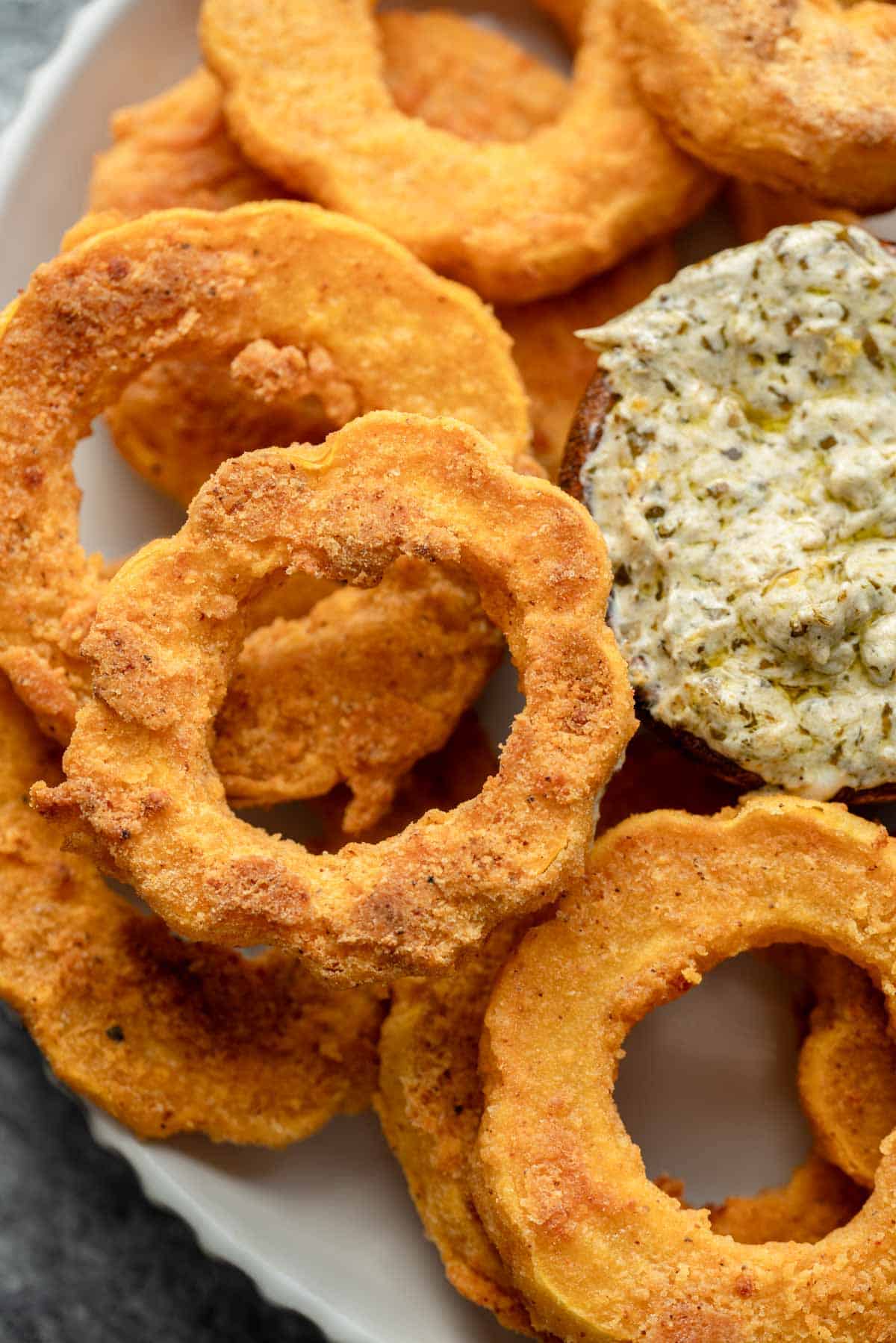 an overhead shot of rispy delicata squash rings
