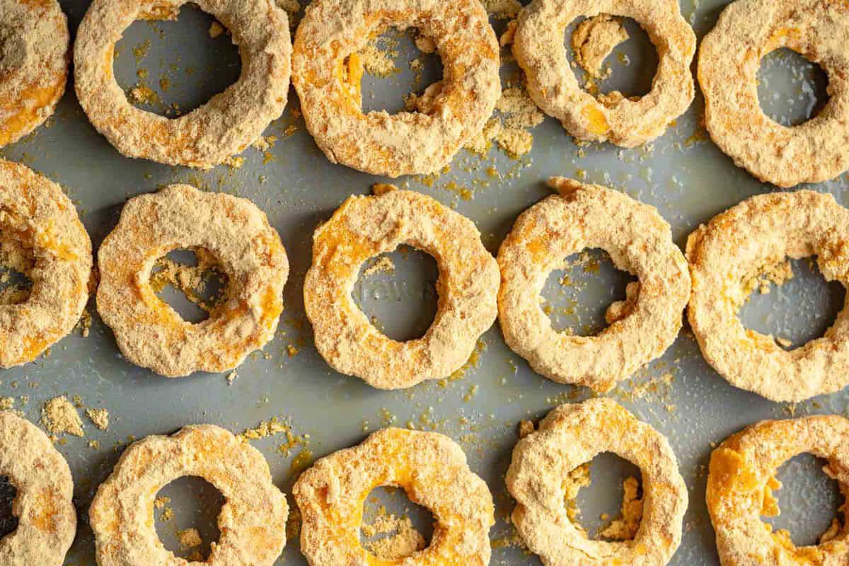 breaded squash on a baking dish