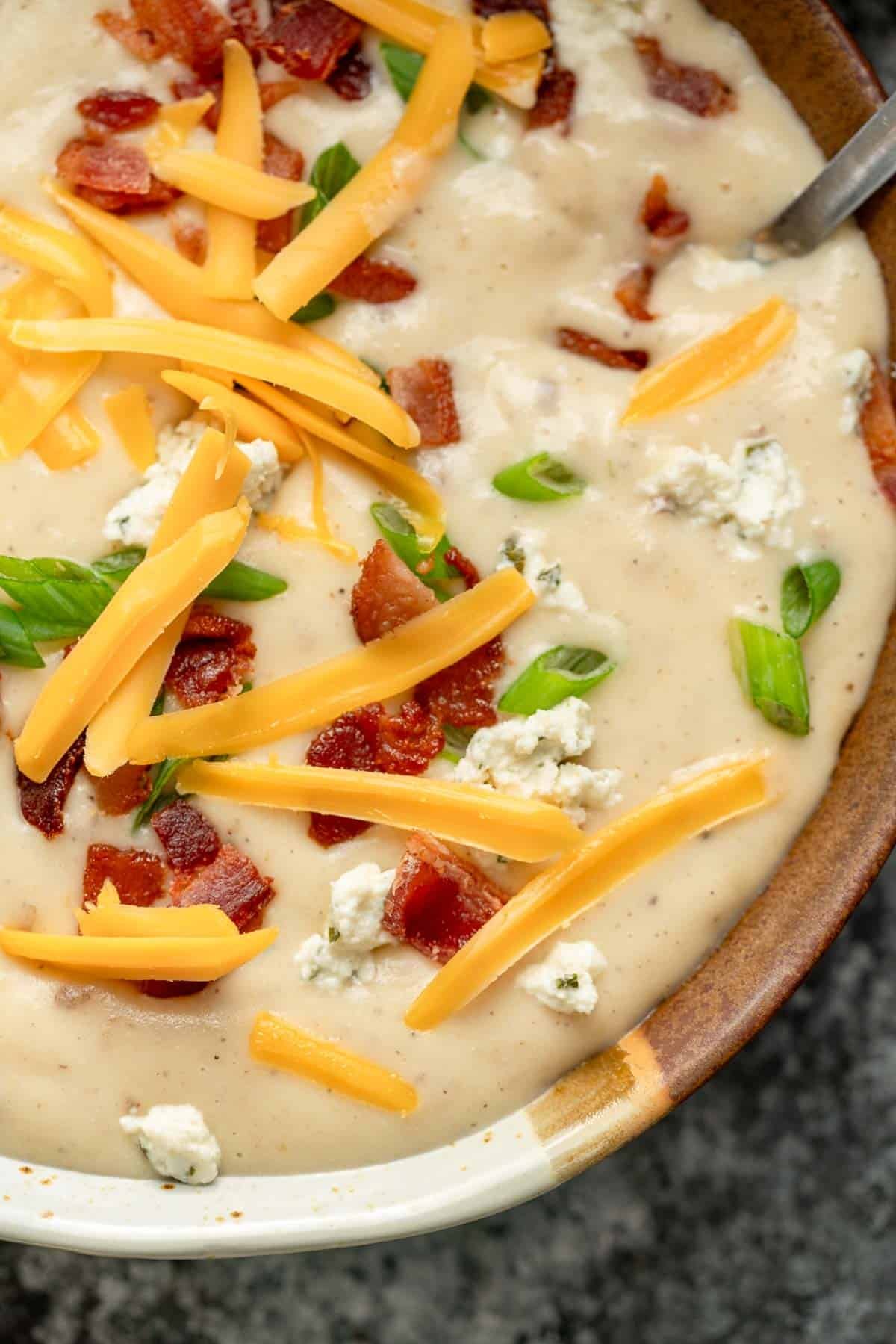 closeup of the ultra creamy potato soup with boursin cheese