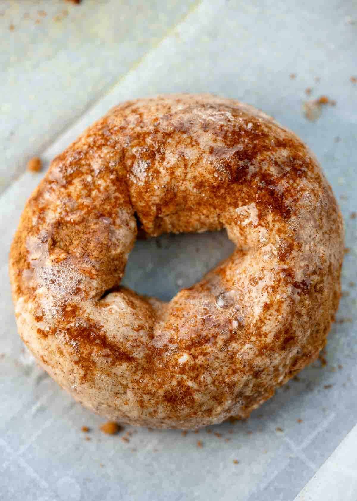 cinnamon high protein bagel on sheet pan prior to placing in oven