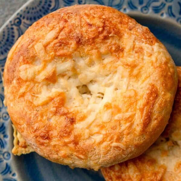 high protein bagel made with cottage cheese on a blue plate