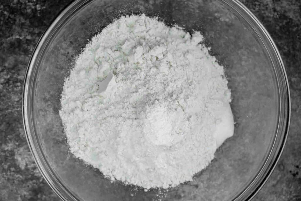 ingredients for high protein cottage cheese bagels in a glass bowl