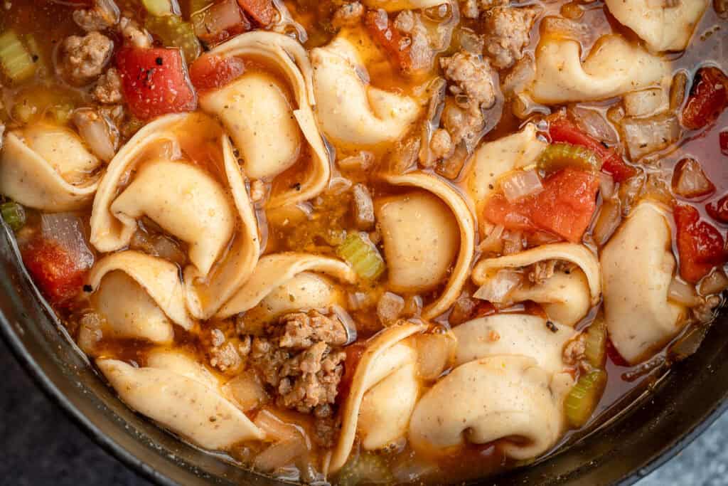 overheat closeup shot of sausage tortellini soup