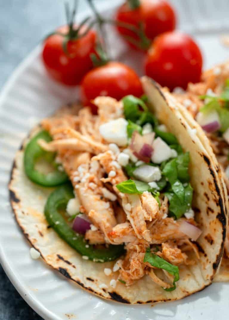 closeup showing juicy chicken tinga tacos