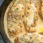 creamy lemon chicken in a cast iron skillet