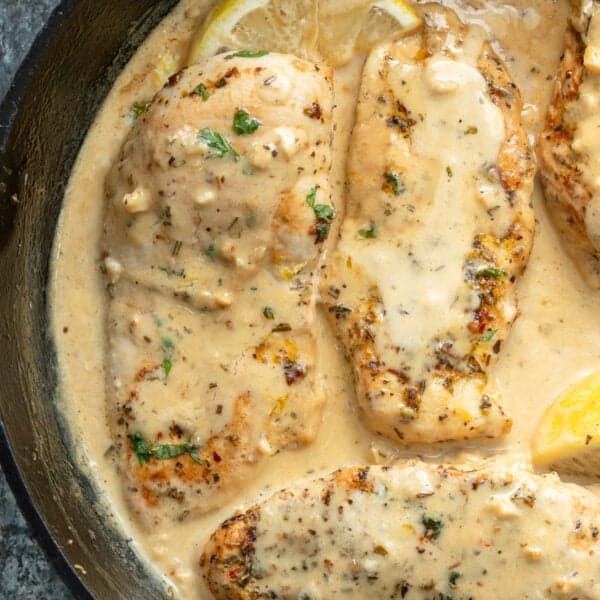 creamy lemon chicken in a cast iron skillet