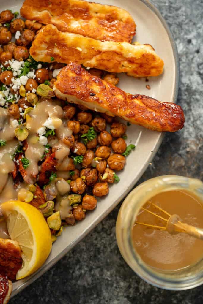 salad ingredients and tahini dressing