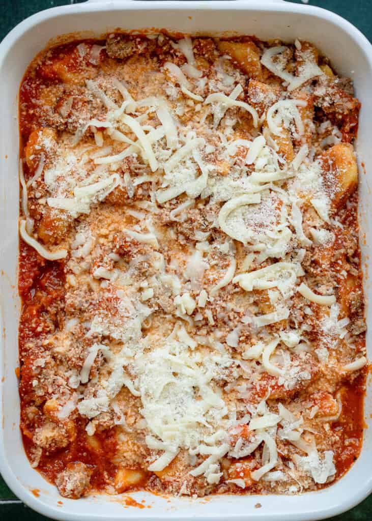 unbaked casserole dish with gnocchi and mozzarella