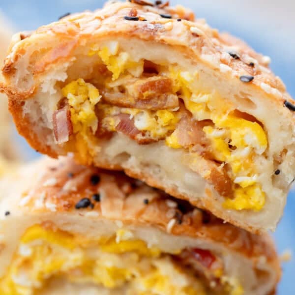 closeup view of breakfast roll filled with bacon egg and cheese in a high protein breakfast hot pocket