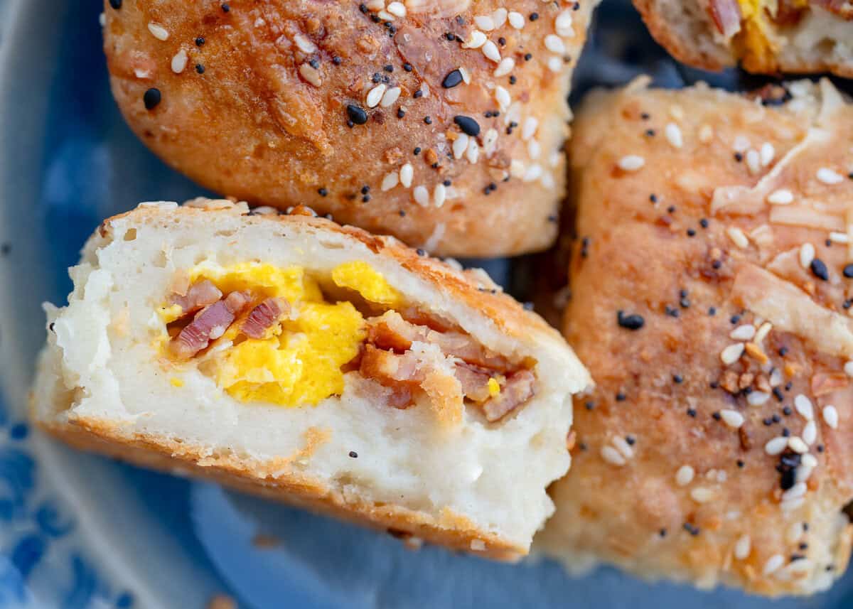 closeup showing the fluffy high protein hot pockets full of breakfast eggs, bacon, and cheese