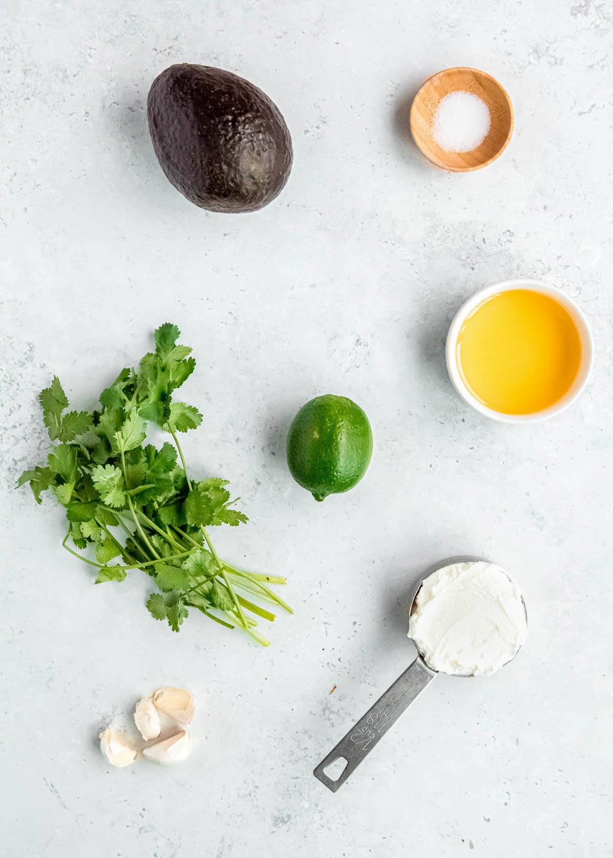 southwest chicken salad dressing ingredients on a white table