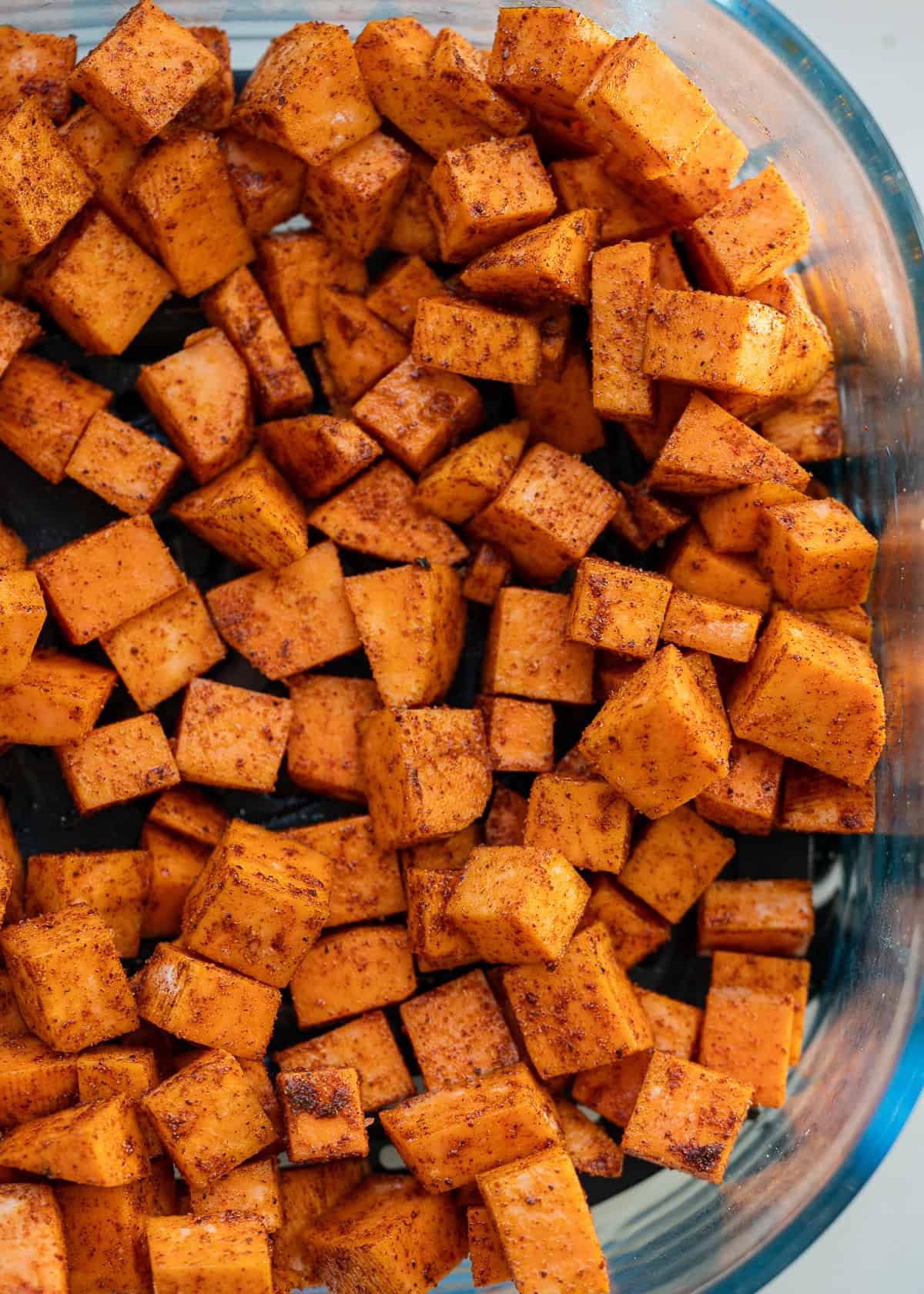 a close up of air fryer sweet potatoes