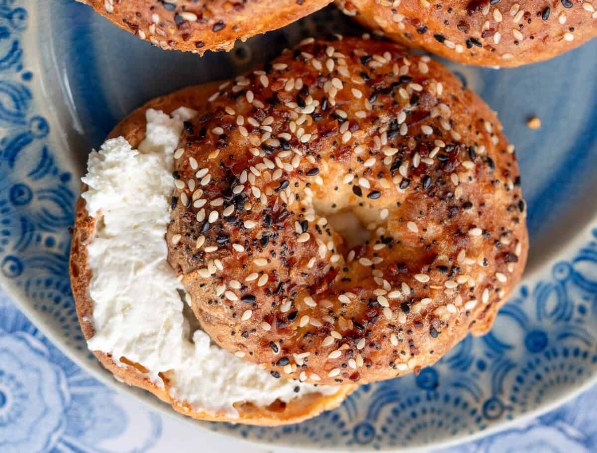 an overhead shot of a sliced and toasted bagel