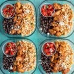 an overhead shot of mexican street corn meal prep bowls