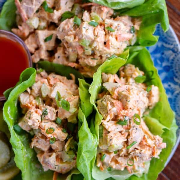 an overhead shot of high protein buffalo chicken salad in lettuce cups