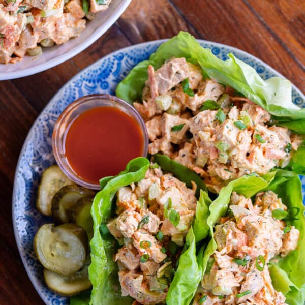 Buffalo Chicken Salad in lettuce cups on a blue plate