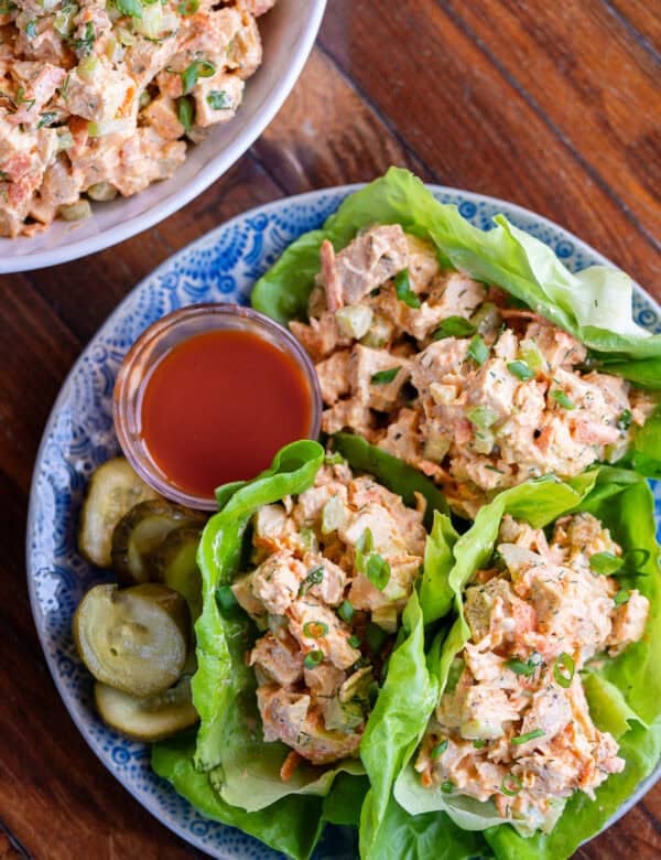 Buffalo Chicken Salad in lettuce cups on a blue plate